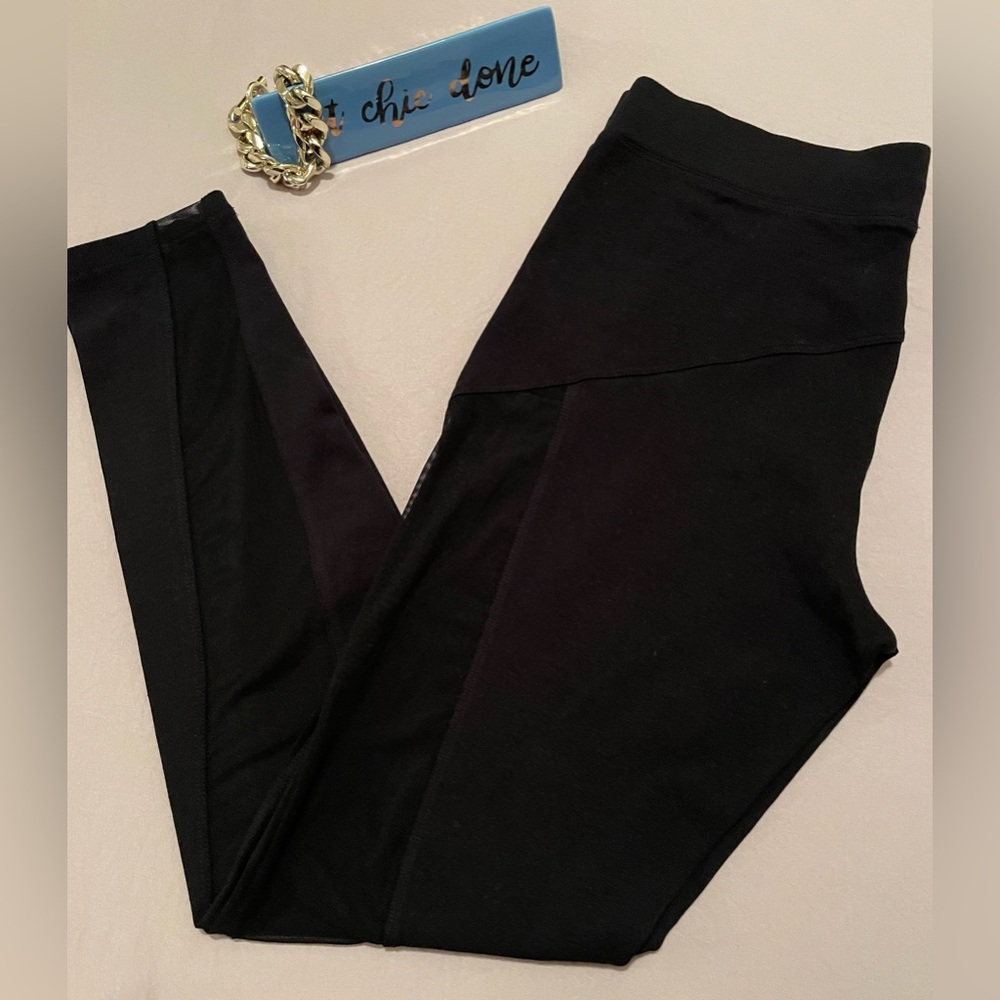 NWT EXPRESS LEGGINGS WITH MESH SIDE PANELS.